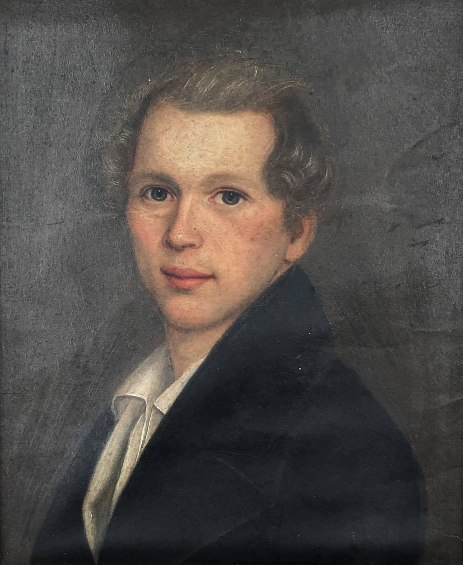 UNSIGNED (XVIII - XIX). Half portrait of a young man.25 cm x 21 cm. Painting. Oil on paper /