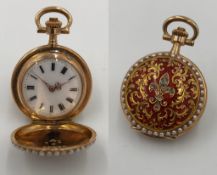 585 gold, three lid pocket watch. 11 diamonds, guilloche enamel, pearls.3 cm diameter without