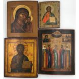ICONS (XIX - XX). 4 icons probably Russia.2 x Christ, 1x Mary with Jesus, 1 x multi-saint icon. Up