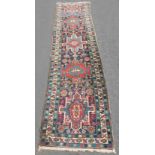 Heriz Persian rug. Runner. Iran. Antique, around 1900.311 cm x 81 cm. Knotted by hand. Wool on