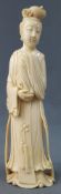 Lady in a long robe. China / Japan. Ivory. Old, around 1920.25,5 cm high. Carved. Typical work