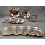 9 plates, 1 bowl and a cup, silver 925. Sterling.665 grams. Up to 17 cm in diameter, hallmarks.9