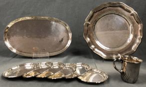 7 plates, 1 cup and 1 tray. Silver 830 and 835.954 grams total weight. Up to 28.5 cm x 17.5 cm.