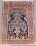 Mashad Persian carpet. Iran. Antique, around 1900.140 cm x 105 cm. Knotted by hand. Wool on