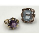 2 rings yellow gold 585.One with amethyst and 6 small diamonds. The other ring with a light blue