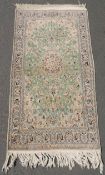 Nain Persian rug. Iran. Very fine weave.214 cm x 113 cm. Knotted by hand. Cork wool and silk on