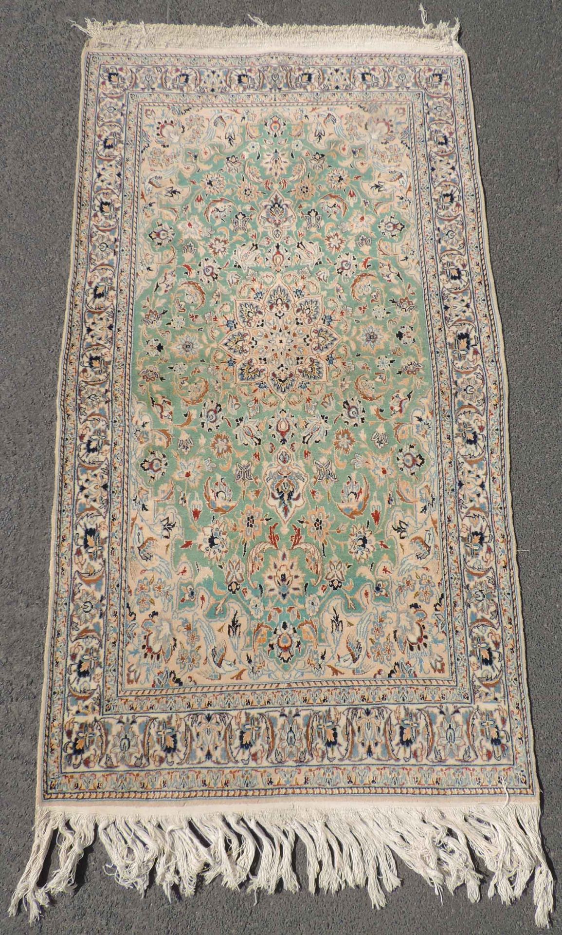 Nain Persian rug. Iran. Very fine weave.214 cm x 113 cm. Knotted by hand. Cork wool and silk on