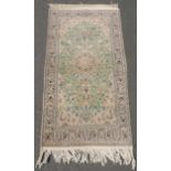 Nain Persian rug. Iran. Very fine weave.214 cm x 113 cm. Knotted by hand. Cork wool and silk on