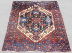 Khamseh Baharlu Persian carpet. Iran. Antique, around 1900.188 cm x 173cm. Knotted by hand. Wool