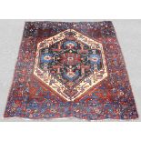 Khamseh Baharlu Persian carpet. Iran. Antique, around 1900.188 cm x 173cm. Knotted by hand. Wool