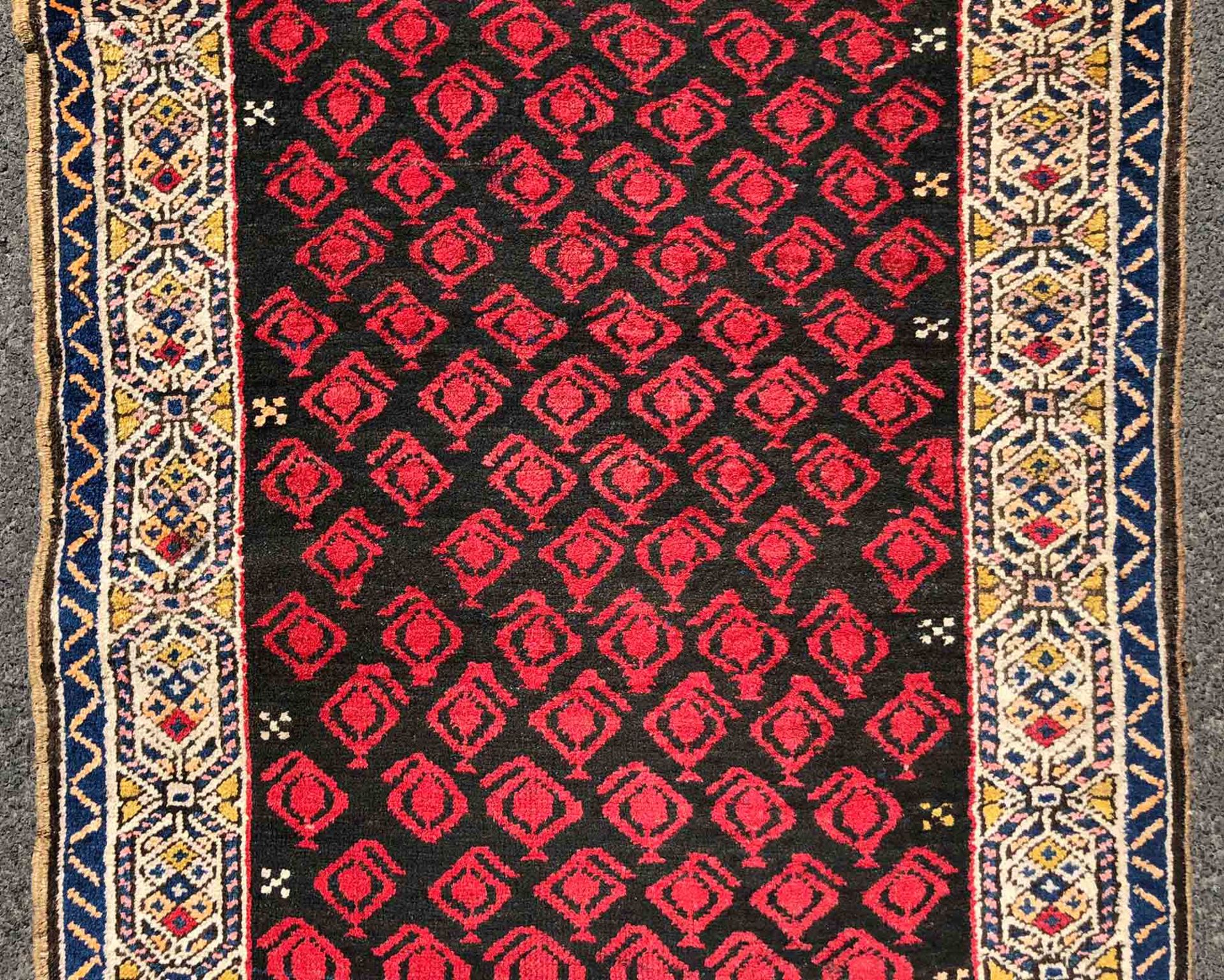 Hamadan Persian carpet. Iran. Antique, around 1910.352 cm x 108 cm. Knotted by hand. Wool on cotton. - Image 3 of 8