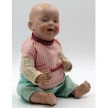 Puppe mit Porzellankopf und Porzellangliedern.41 cm hoch.Doll with porcelain head and porclain