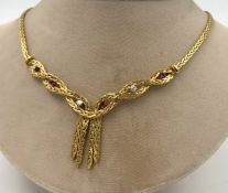 Collier Gold 750 mit Brillanten und Rubinen.Gesamtgewicht 41,3 Gramm. Die 3 Diamanten zusammen circa