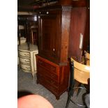 An oak corner cupboard with panel door and a reproduction yew bachelor's chest with hinged top above