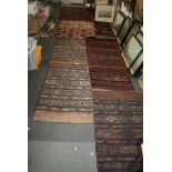 A collection of mainly vintage tribal weavings, probably North African, comprising six various bags,