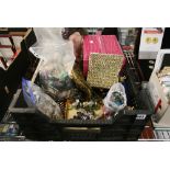A plastic crate containing a considerable quantity of costume jewellery, a pink jewel box, evening