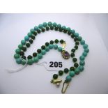 Two bead necklaces, one of turquoise with 9 ct amethyst and pearl clasp, the other of green agate