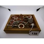 A selection of silver and silver-plated rings, 20 items in wooden box. FOR DETAILS OF ONLINE BIDDING
