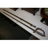 A Victorian officer's sword, with straight blade, 'proved' button, openwork gilt-metal guard and