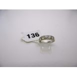 An 18 ct white gold and seven stone diamond half-hoop ring, diamond weight estimated 1.5 ct. FOR