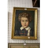 A mid-20th century oils on canvas portrait of a curly-haired child (39 x 29 cm), framed FOR
