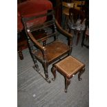 A Victorian copy of an unusual 17th century-style open armchair on turned supports with down-swept