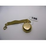 A 15 ct gold sovereign case and a 9 ct gold fob FOR DETAILS OF ONLINE BIDDING ON THIS LOT CONTACT