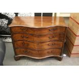 A George III mahogany serpentine dressing chest, of four long drawers with original swan neck