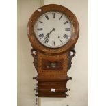 An American walnut-cased drop-dial wall clock [on wall between ss 70 and 74] FOR DETAILS OF ONLINE