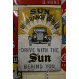 An enamel 1930's Sun Insurance Office advertising sign, yellow ground, Reg. No. 1710, Drive with the