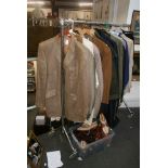 A rail of good gents' clothing including jackets, some Italian, Valentino, a Burberry coat, Driza-