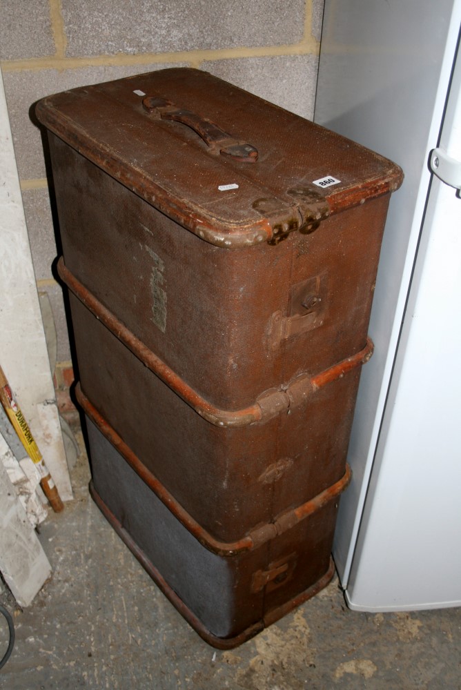 An old fabric covered wooden-bound cabin trunk. FOR DETAILS OF ONLINE BIDDING ON THIS LOT CONTACT