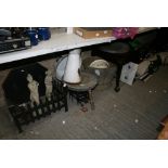 A miscellaneous collection of various household items, including fire grate, brazier table, garden