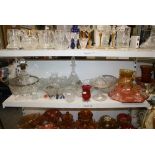 A mixed lot of various glass items including dressing table set, fruit bowls, decanters, and a