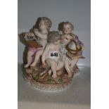 A 19th century Meissen group of three cherub geographers, with globe, book, and compasses, incised