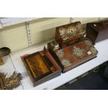 An elaborate Victorian writing slope in burr walnut and cut brass, fitted with a stationery