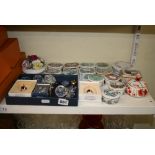 Half a shelf of crystal models of animals, a collection of porcelain, music boxes, a Crown