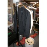 A small quantity of gents clothing including wool, jackets and trousers, a Panama hat in box and a