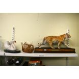 Two shelves of ceramic and other tiger, cat, bear, squirrel, and swan models [s 74, 80] FOR
