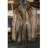 A lady's raccoon fur jacket with wide collar [upstairs rail by silver shelves] FOR DETAILS OF ONLINE
