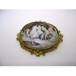 A large fine Victorian shell cameo brooch depicting Europa and the Bull, in gold scroll mount, the