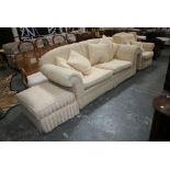 A substantial and very comfortable settee upholstered in a modern cream patterned fabric, with