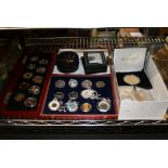 Collectors' coins some with enamel highlights in a fitted glazed box, a quantity of collectable