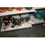 A miscellaneous collection of antique and collectable ornaments, including figures of dogs,