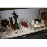 Two shelves of miscellaneous household items and tableware, including a Wedgwood Etruria wares