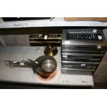 A Denon stacking sound system, a set of four graduated heavy gauge copper saucepans and a banker's