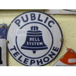A USA (7 in diameter) round Public Bell System Telephone advertising sign. FOR DETAILS OF ONLINE