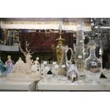 Various glass items, comprising jugs for claret and water, hollow-stemmed wine glasses, and a faux