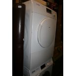 A Bosch Classixx 7 Dryer and a Miele W Classic Eco Washing Machine. FOR DETAILS OF ONLINE BIDDING ON