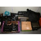 A large collection of vintage camcorders, including Panasonic (x2), Sony, Hitachi, RCA, also a